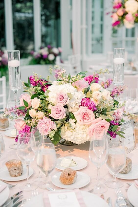 Wedding table decorations for pink and greenery March wedding
