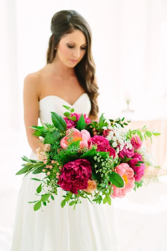 Wedding bouquets for silver and fuchsia March wedding