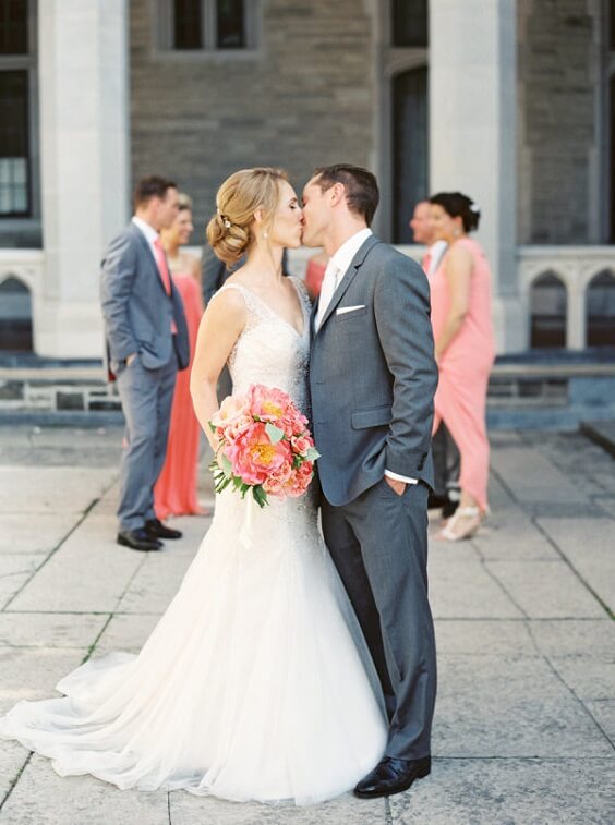 Grey suits for coral and yellow March wedding