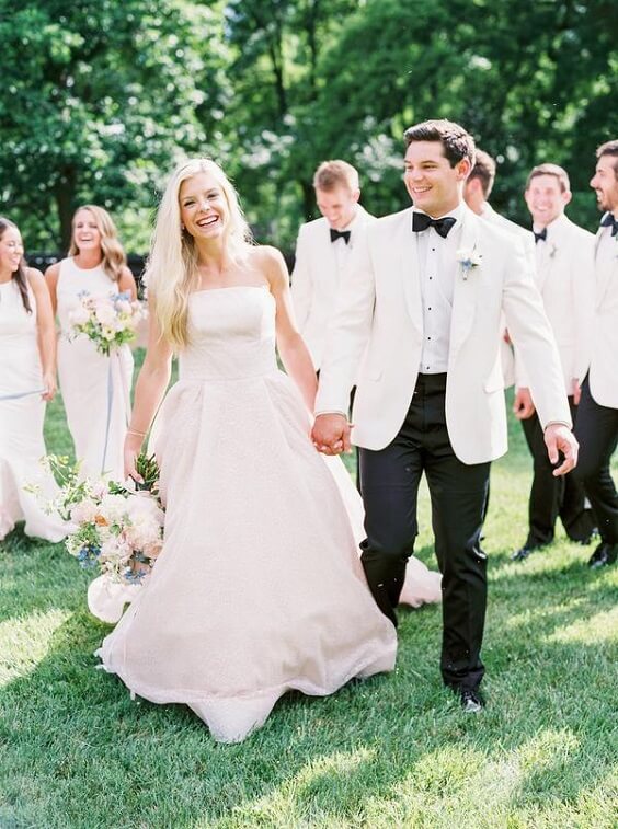White suits for white and pink March wedding