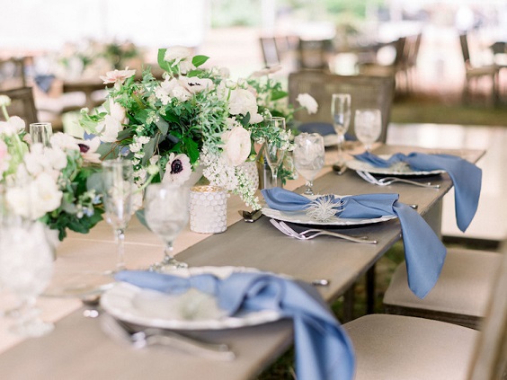 Table decorations for dusty blue and pink March wedding