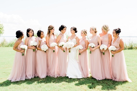 Blush bridesmaid dresses for blush and white March wedding