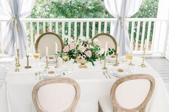 Table decorations for blush and white March wedding