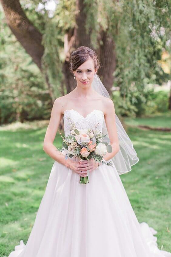 Bridal gown for blush and peach June wedding