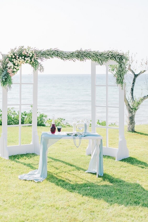 Wedding arch decoratins for Ice Blue and White June Wedding 2020