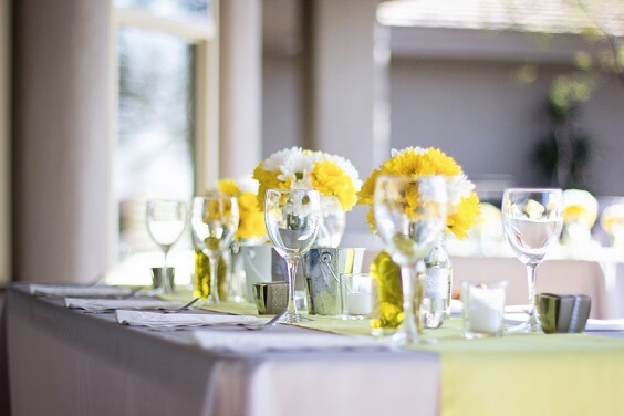 Wedding table decorations for Yellow, White and Grey August Wedding 2020
