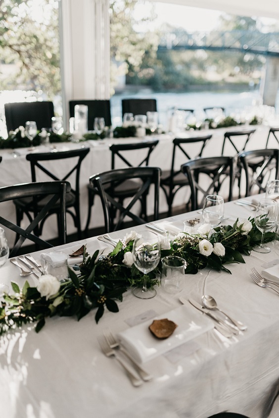 white tablecloth and green centerpieces for january wedding colors 2022 black white and green