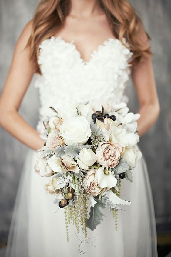 white bridal gown and bouquet for january wedding colors 2022 neutral colors