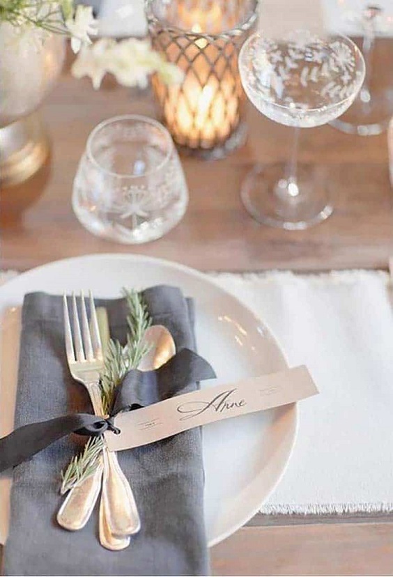 grey table place setting for february wedding colors 2022 dusty blue slate grey and brown colors