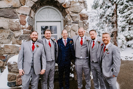 navy groom suit grey groomsmen suit red tie for february wedding colors 2022 red grey and navy blue colors