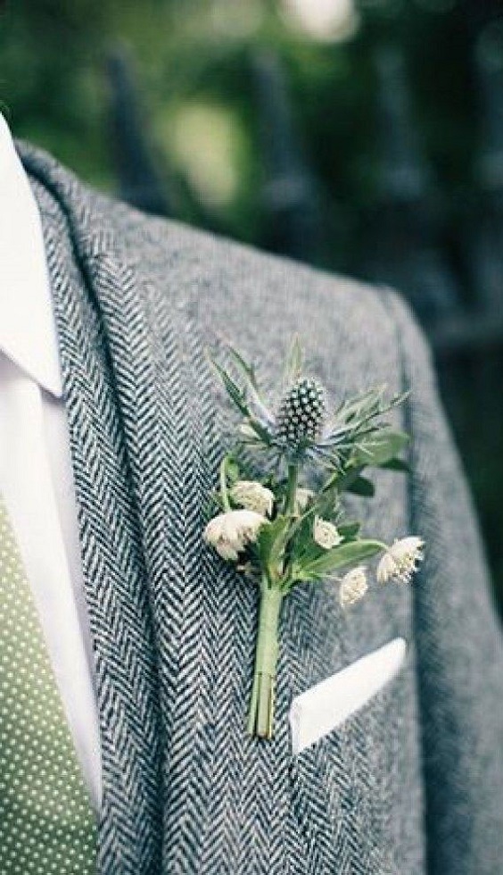 grey mens suit and green boutonniere for march wedding colors 2022 grey and greenery