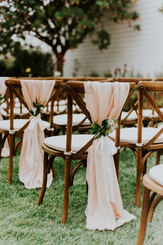 chairs with blush draped fabric for march wedding colors 2022 sage green and blush