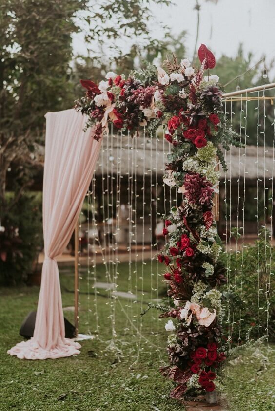 blush burgundy wedding ceremony arch for fall wedding colors 2022 burgundy and blush