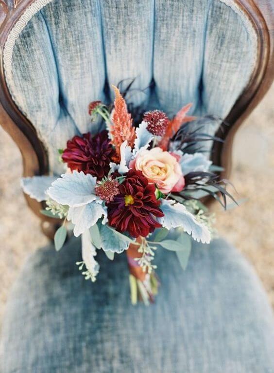 blue chairs and burgundy flowers for fall wedding colors 2022 dusty blue and burgundy