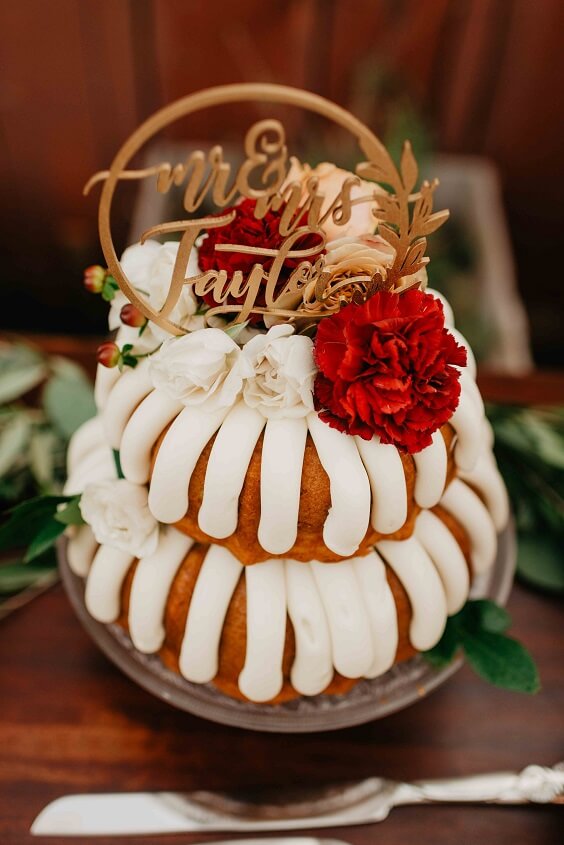 wedding cake with rust flower for fall wedding colors 2022 rust and yellow