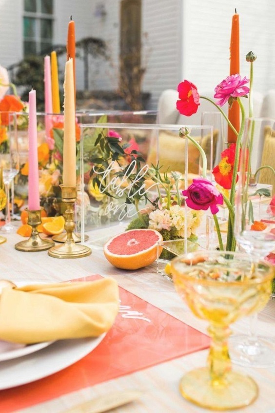 table setting for summer wedding color 2022 tangerine yellow and fuschia