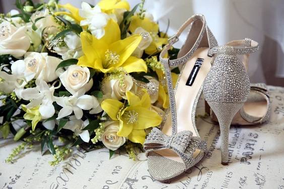 yellow and white bouquets silver wedding shoes for summer wedding color 2022 yellow and silver colors