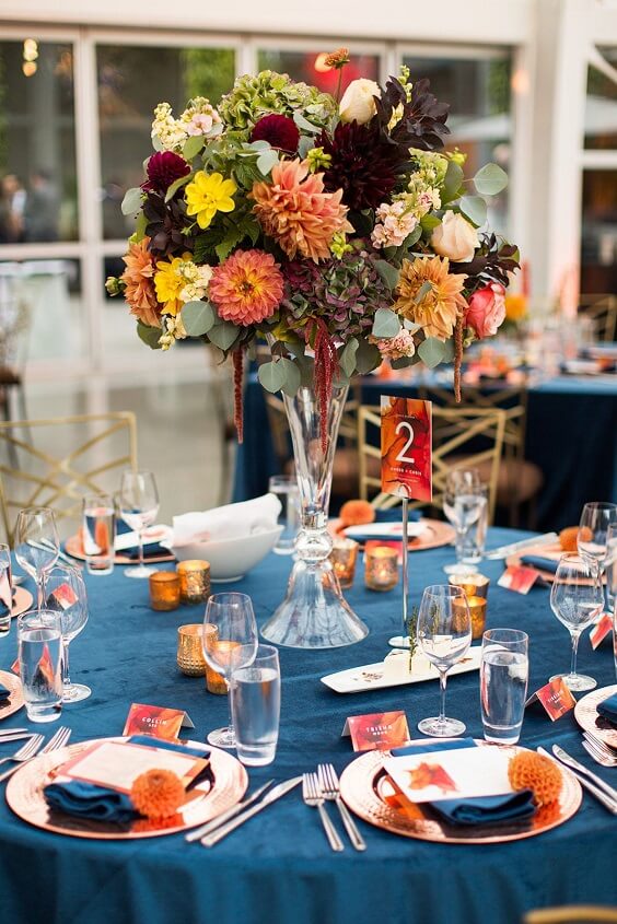dark blue and orange table setting for winter wedding colors 2022 dark blue and orange