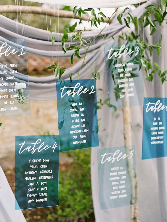 table and name cards for august wedding colors 2022 teal