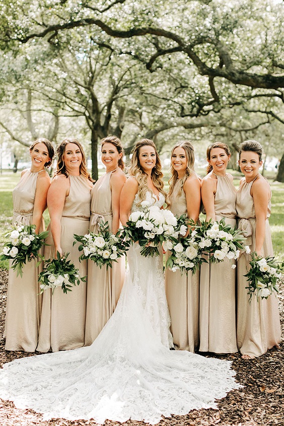 champagne bridesmaid dresses white bridal gown white flower and greenery bouquets for fall wedding colors 2023 champagen and greenery