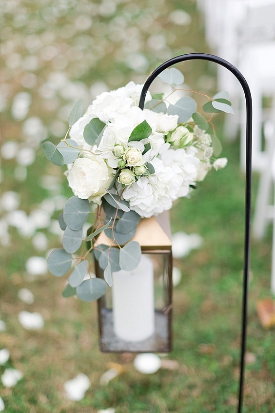 sage greenery and white flowers decoration for sage green wedding colors 2023 sage green and white