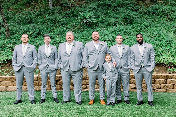 groomsmen in grey suits white shirts and grey ties for sage green wedding colors 2023 sage green and grey
