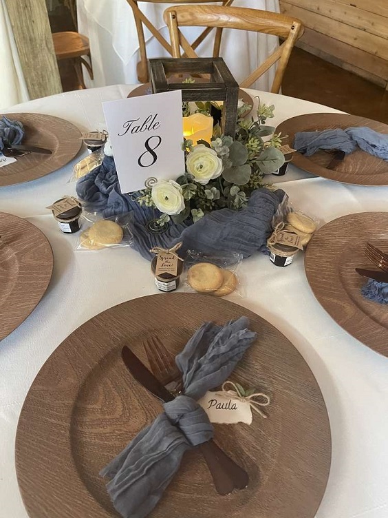 wedding table number card with dusty blue cloth decoration for sage green wedding colors 2023 sage green and dusty blue