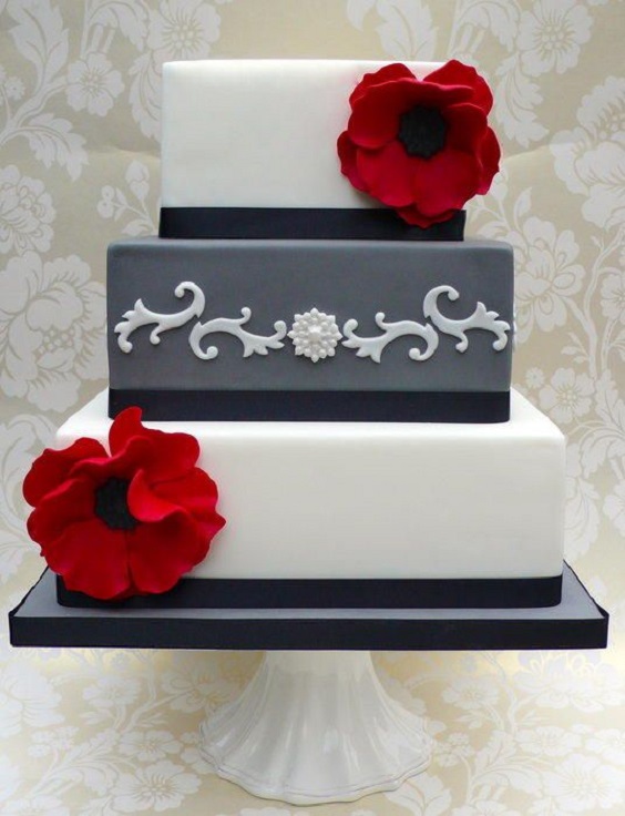 grey and black wedding cake dotted with red flowers for red and black wedding colors red black and grey