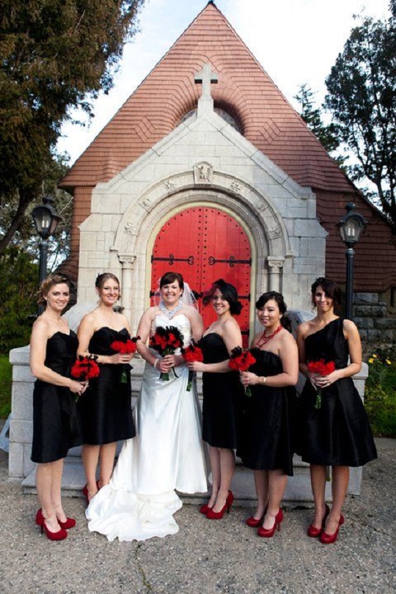 black bridesmaid dresses in red bouquets and red shoes white bridal gown for red and black wedding colors red black and silver