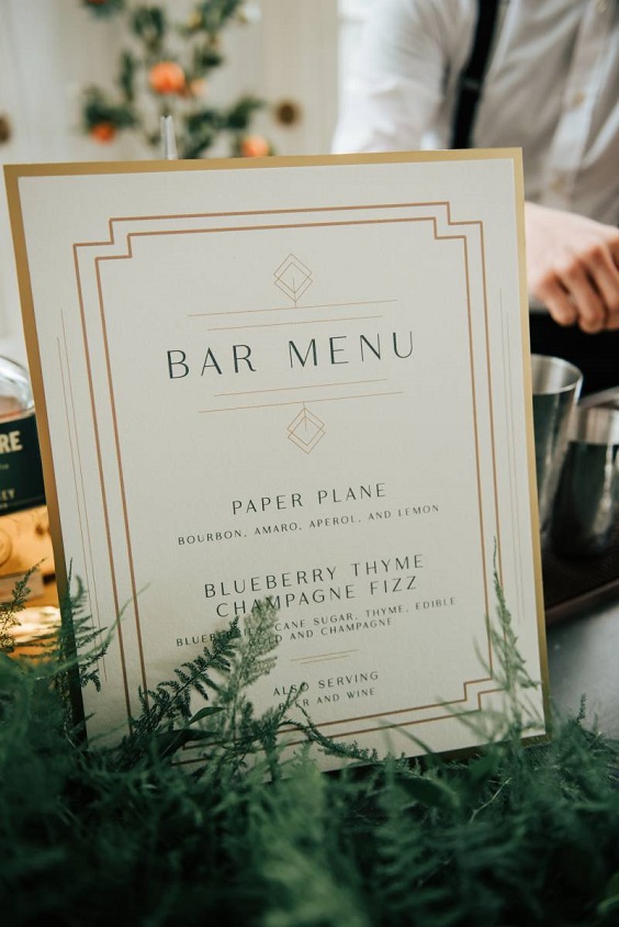 white and gold bar menu for winter wedding colors 2023 emerald green and gold