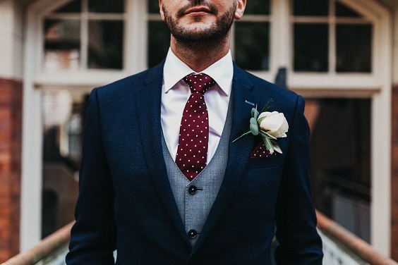 navy mens suit and burgundy tie for winter wedding colors 2023 burgundy and navy