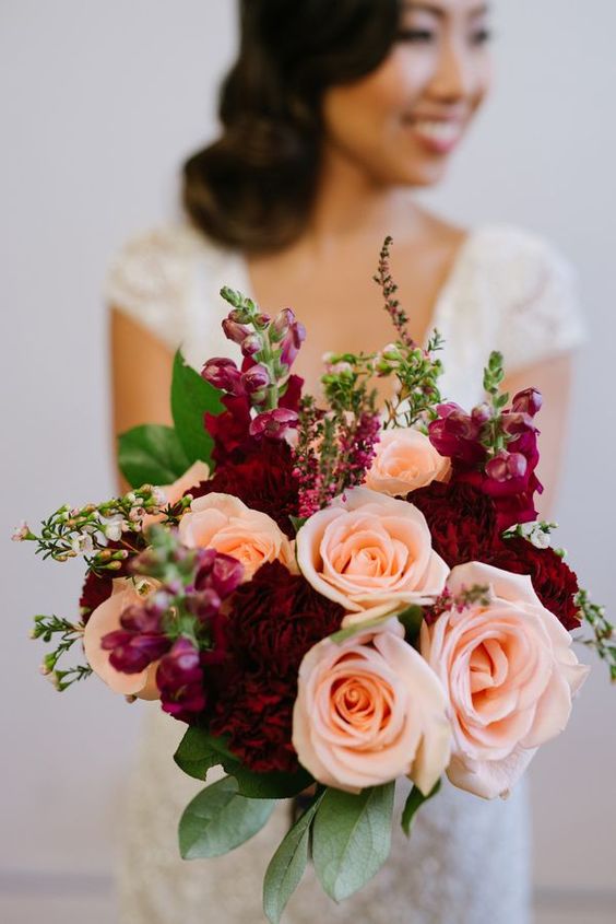 bridal bouquets in dark red and peach roses for red wedding colors 2023 dark red and peach