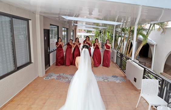 red bridesmaid dresses and white bridal gown for red wedding colors 2023 red and green