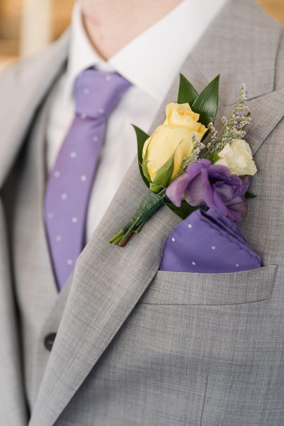 grey bridegroom suit lavender tie and lavender and yellow flower corsage for august wedding colors 2023 lavender and yellow