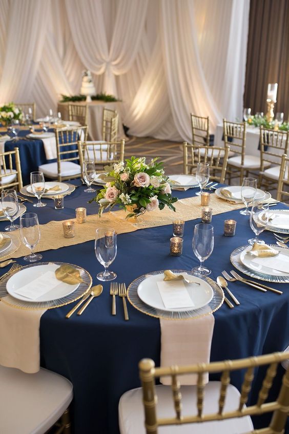 navy blue wedding tablecloth and champagne napkins for august wedding colors 2023 champagne navy and brown