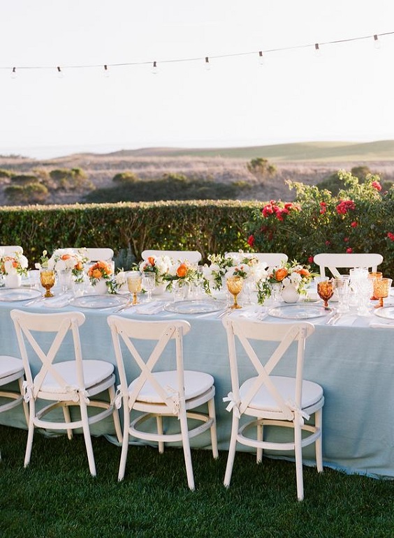 light blue wedding table linen for august wedding colors 2023 light blue coral and peach