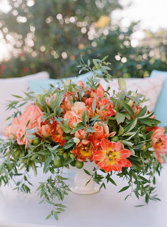 peach and coral flower wedding centerpieces for august wedding colors 2023 light blue coral and peach