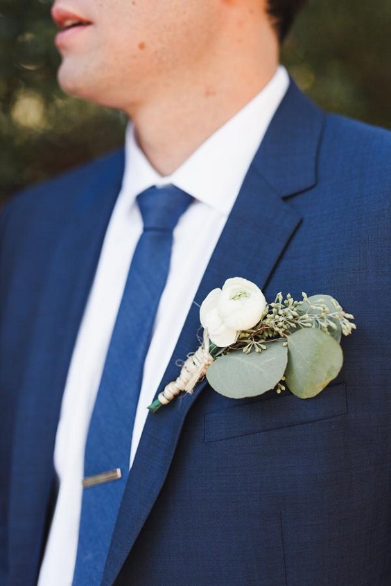 navy bridegroom suit white shirt and white flower and greenery corsage for august wedding colors 2023 navy white and greenery