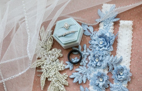 wedding ring in a ice blue box and ice blue wedding garter for blue wedding colors 2023 ice blue and peach