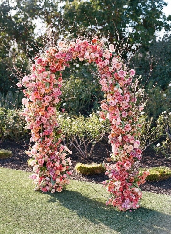Ceremony Arch Decorations for Sky Blue and Coral June Wedding Color Palettes 2023