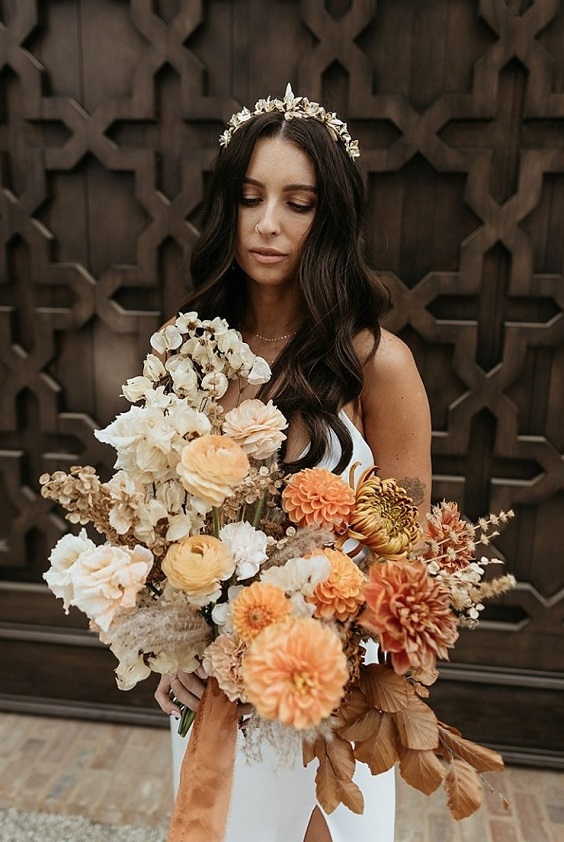 orange brown and white bridal bouquet for november wedding colors 2023 champagne navy and brown