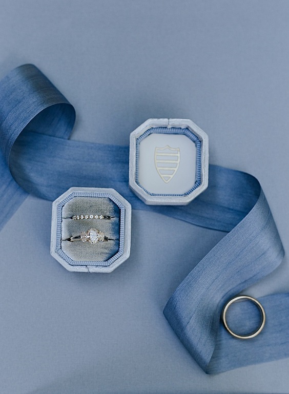 wedding rings in a light blue box for november wedding colors 2023 shades of blue