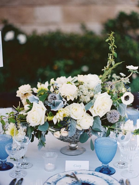 white flower and greenery wedding centerpieces ice blue bottles for november wedding colors 2023 shades of blue