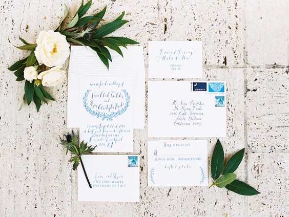 white wedding stationery with sky blue printing for november wedding colors 2023 shades of blue