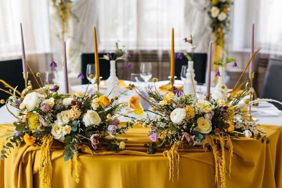mustard yellow wedding tablecloth mustard yellow and lavender flowers and candles decorations for november wedding colors 2023 mustard yellow and lavender