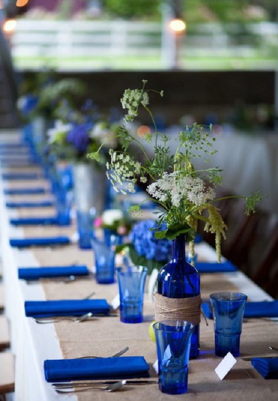 Royal blue table napkins, royal blue jars for Royal Blue and Green Wedding Color Palettes 2023