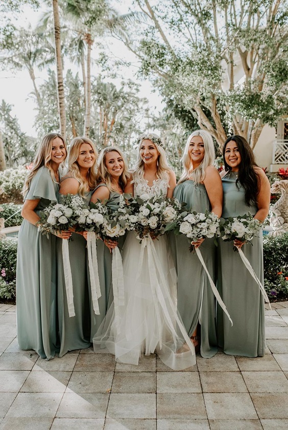 sage green bridesmaid dresses and white bridal gown for green wedding theme 2023 sage green colors