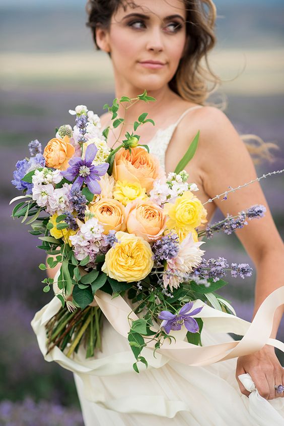 lavender and yellow bridal bouquet for april wedding color schemes for 2023 lavender and yellow