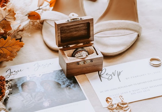wedding ring in a wood box for april wedding color schemes for 2023 terra cotta and nude