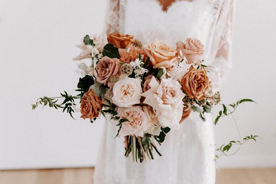 white blush and light orange flower bridal bouquet for april wedding color schemes for 2023 white blush and orange